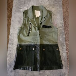 Hint green and black vest medium